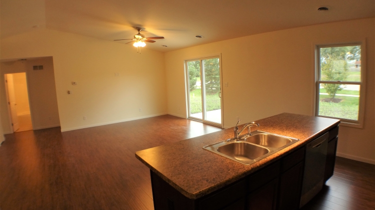 The Cheyenne - Family Room looking over island.